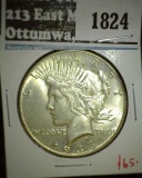 1935 Peace Dollar, AU/UNC, value $65