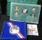 1986 S Statue of Liberty Half Dollar in original box of issue and 1994 S U.S. Proof Set.