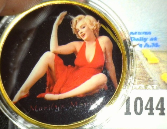 Large encapsulated Marilyn Monroe Medal, depicted on one side nude in gleaming gold and on the other