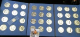 1964-85 Set of Kennedy Half Dollars in BU condition and an extra Mercury Dime in EF. All stored in a
