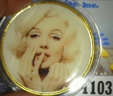 Large encapsulated Marilyn Monroe Medal, depicted on one side nude in gleaming gold and on the other