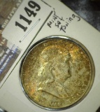 1952 D Franklin Half Dollar. Brilliant Uncirculated with Mint set toning.