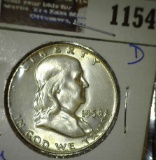 1958 D Franklin Half Dollar, Brilliant Uncirculated with Full Bell Lines.