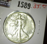 1943 D High grade Walking Liberty Half Dollar.