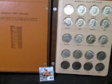 Very attractive World Coin Library Album with a nice partial set of BU & Proof Kennedy Half Dollars.