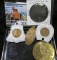 Plastic case containing 2010 Pella Tulip Time Medal; Counterfeit Seated Half Dollar; Pair of Encased