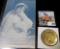 1974 24K Gold-plated Eisenhower Dollar & an early 1900 era Postacard depicting a full figured Lovely