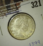 1899 P Barber Quarter with mint error cud on tail feathers of eagle.