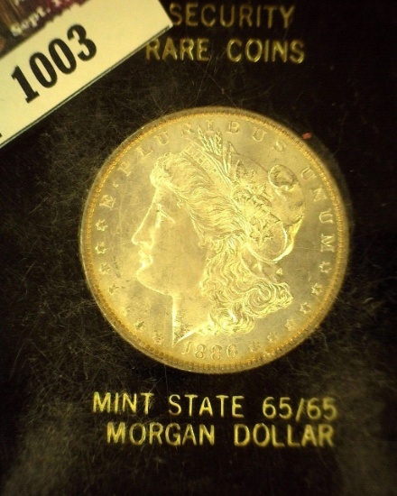 1886 P Morgan Silver Dollar, Slabbed by Security Rare Coins Mint State 65/65.