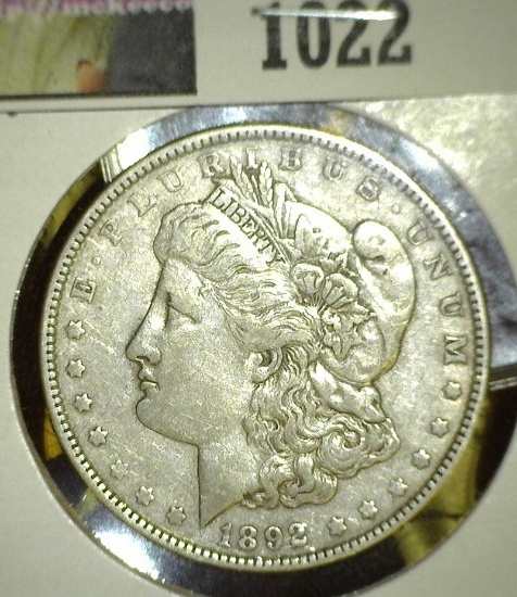 1892 P Morgan Silver Dollar.