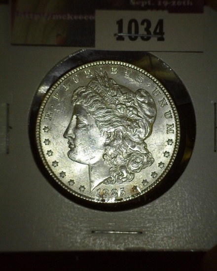 1885 P Morgan Silver Dollar, Brilliant Uncirculated.