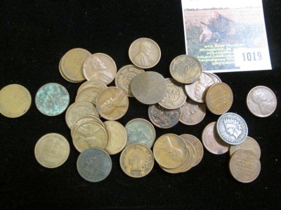 Small group of unsorted Lincoln And Indian Cents.