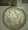 1886 P Morgan Silver Dollar.