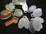 Pair of Key Rings full of various Lodge, Social Security, & Masonic tags.