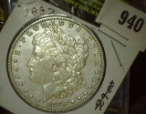 1883 P Morgan Silver Dollar.