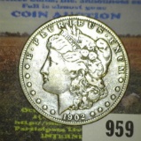 1902 S Morgan Silver Dollar.