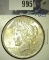 1925 P High Grade U.S. Peace Silver Dollar.