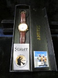 Stauer Wristwatch, new in box. Needs a battery.
