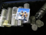 Over two-hundred old Jefferson Nickels in tubes and wrappers. Includes (40) Silver World War II Nick