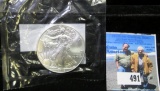 2016 American Eagle Silver Dollar in Littleton cellophane, Gem BU.
