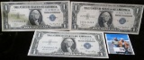 Pair of Series 1935 & (1) Series 1935E One Dollar Silver Certificates. One appears to grade near EF.