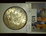 1899 O Morgan Silver Dollar. Brilliant Uncirculated. Nicely toned.