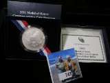 2011 S Silver BU Medal of Honor Dollar in original box as issued with COA.