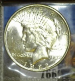 1922 D Brilliant U.S. Peace Silver Dollar.