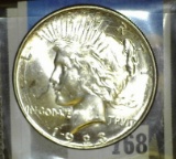 1923 D Brilliant U.S. Peace Silver Dollar.
