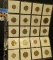 (20) Foreign Coins dating back to 1964 stored in a plastic page.