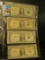 (1) Series 1935 D & (3) Series 1935 E One Dollar Silver Certificates stored in a four-pocket plastic