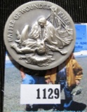 HIGH RELIEF STERLING SILVER MEDAL COMMEMORATING THE BATTLE OF WOUNDED KNEE.  IT WAS THE SITE OF THE
