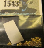 Alaska Placer Gold weighing 0.6453 grams.