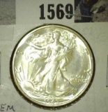 1945 S Walking Liberty Half Dollar, Brilliant Uncirculated.
