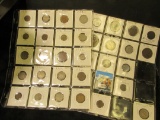 (36) Foreign Coins dating back to 1853 in a pair of plastic pages.