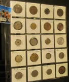 (20) Foreign Coins dating back to 1863 stored in a plastic page. Includes a Silver 1937 Irish Shilli