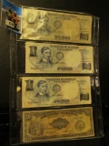 (3) One Piso & (1) 10 Pesos Philippines Banknotes stored in a plastic page.