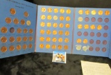 1959-84 Partial Set of Lincoln Cents in a blue Whitman folder. Includes a couple 1943 Steel Cents.