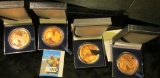(4) Walking Liberty One Ounce Copper rounds in special cases.