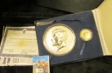 Half Pound Kennedy Commemorative Proof enriched in Genuine .999 Fine Silver. Comes with display box