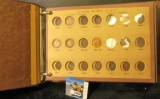 Partial Set of Buffalo Nickels and Indian Head Cents in an old Wayte Raymond Coin album.