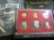 1908 Indian Head Cent in a Littleton Coin wrapper; & 1980 S U.S. Proof Set in original holder as iss