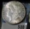 1880 O Morgan Silver Dollar, Brilliant Uncirculated.