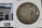 1877 P U.S. Trade Silver Dollar, obverse scratch.