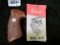 Set of used Colt pistol grips in a Pachmayr pistol grips box