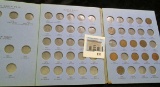 1892-1908 Partial Set of Indian Head Cents in a blue Whitman folder. (10 coins).