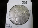 1928 P Key Date U.S. Peace Silver Dollar, slight damage, but exceedingly Rare.