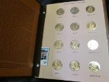 2000-2010 S Proof or Gem BU Sacagawea Dollar Set displayed in a World Coin Library album. (33 pcs.)