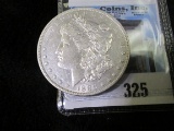 1886 O Morgan Silver Dollar, a nice attractive grade.