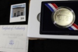 1991 USO 50th Anniversary Uncirculated Silver Dollar, original as issued with C.O.A.